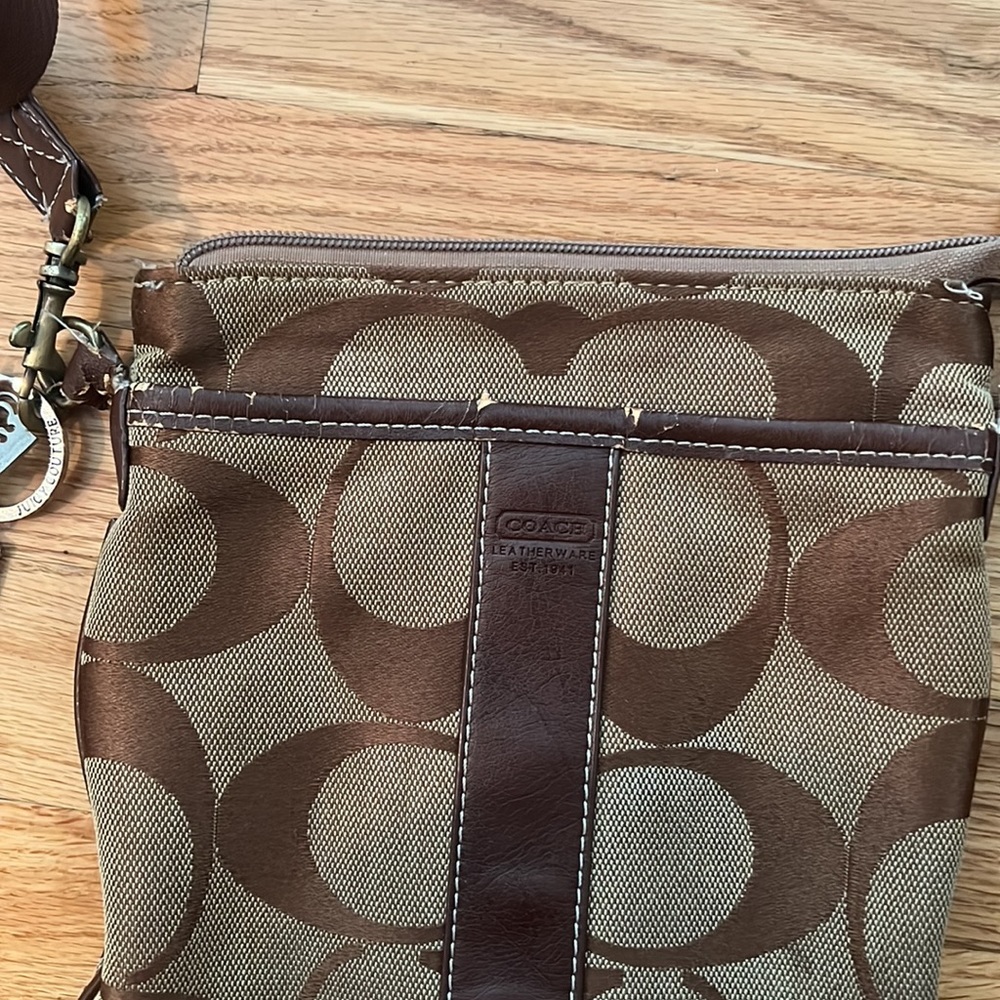 Coach cross body bag with juicy couture keychain (can be removed).